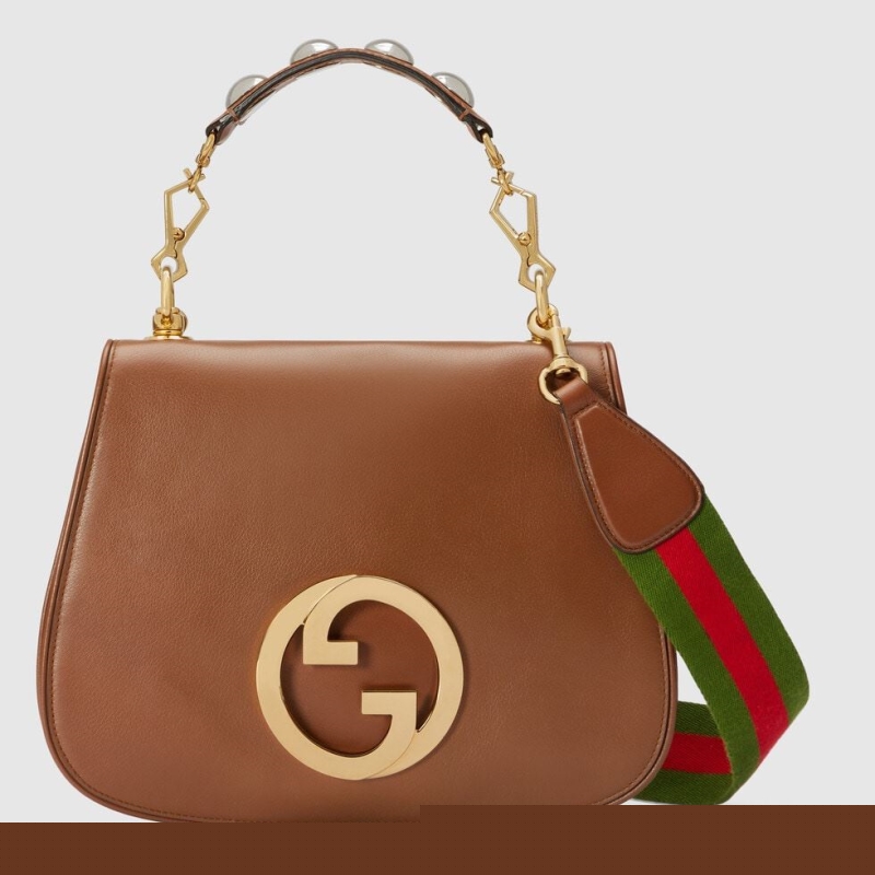 G*u*i top handle bags